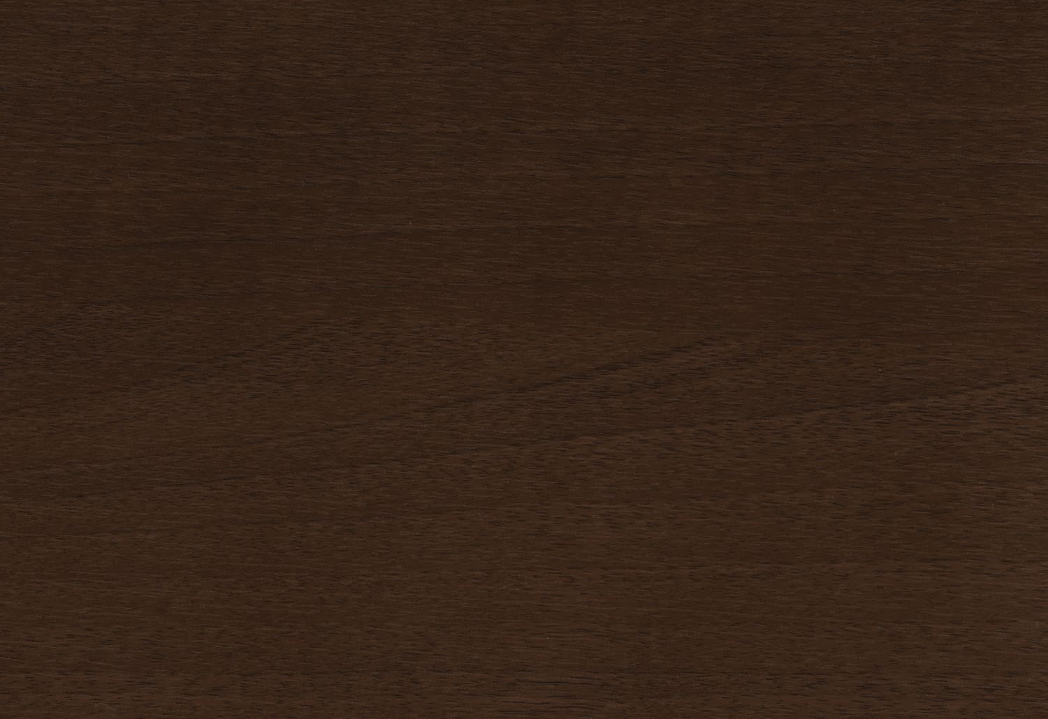 A close up image of a dark brown wooden surface.